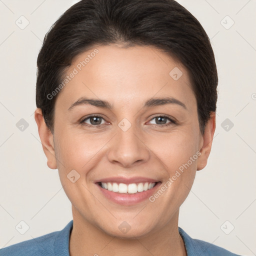 Joyful white young-adult female with short  brown hair and brown eyes