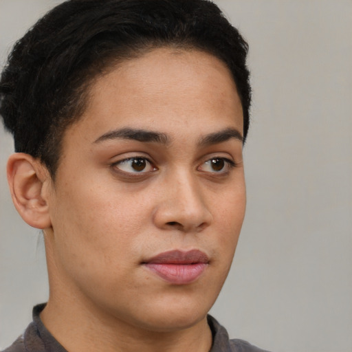 Neutral latino young-adult female with short  brown hair and brown eyes