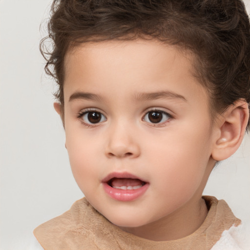 Joyful white child female with short  brown hair and brown eyes