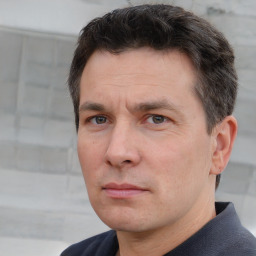 Neutral white adult male with short  brown hair and brown eyes