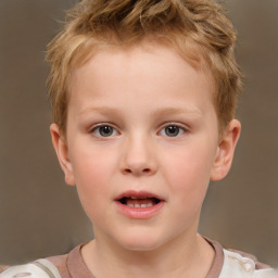 Joyful white child male with short  brown hair and brown eyes