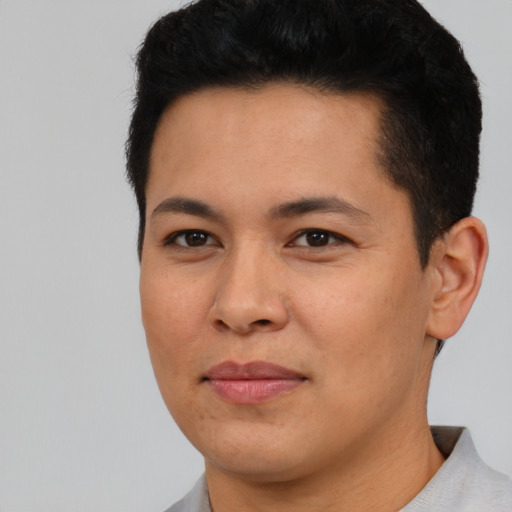 Joyful asian young-adult female with short  black hair and brown eyes