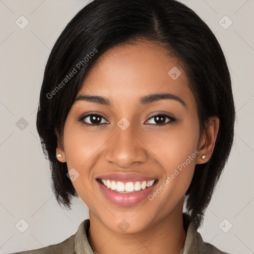 Joyful latino young-adult female with medium  black hair and brown eyes