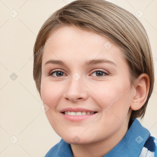 Joyful white young-adult female with medium  brown hair and blue eyes