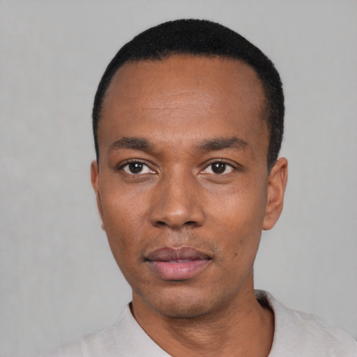 Neutral black young-adult male with short  black hair and brown eyes