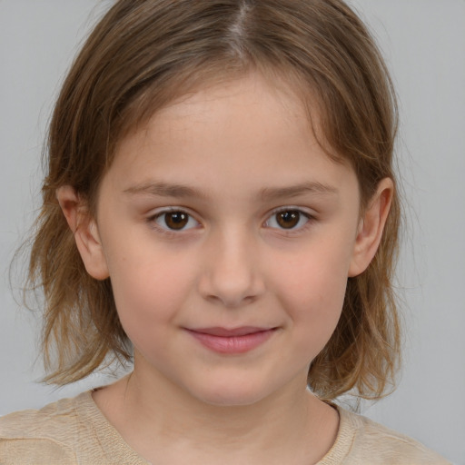 Joyful white child female with medium  brown hair and brown eyes