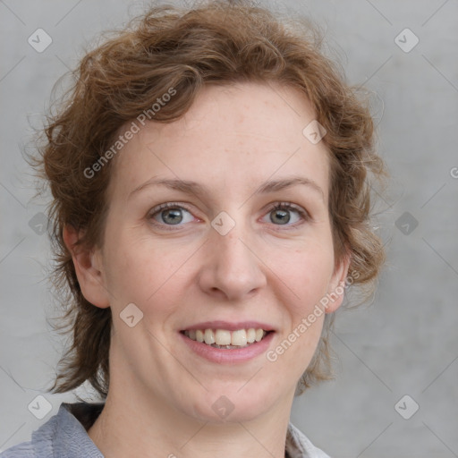 Joyful white young-adult female with medium  brown hair and blue eyes