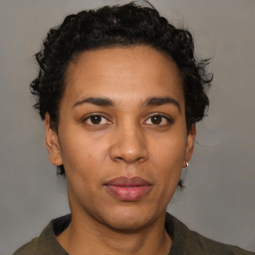 Neutral latino young-adult female with short  brown hair and brown eyes