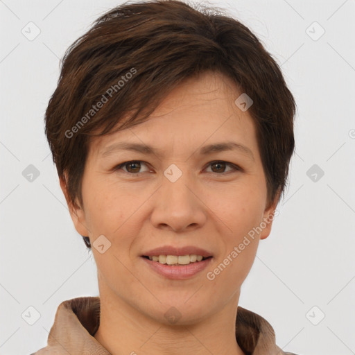 Joyful white adult female with short  brown hair and brown eyes