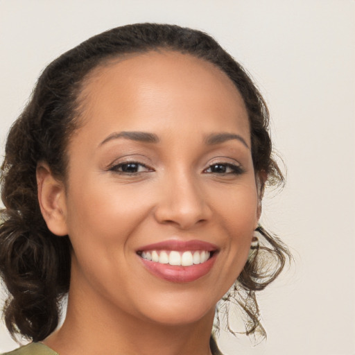 Joyful white young-adult female with medium  brown hair and brown eyes