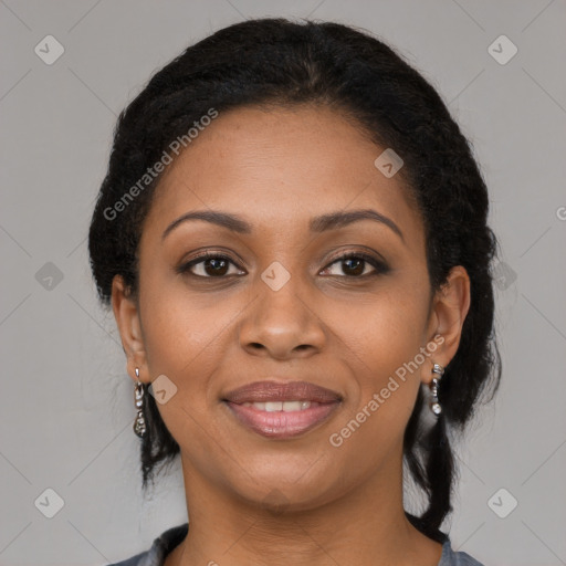 Joyful black young-adult female with medium  brown hair and brown eyes