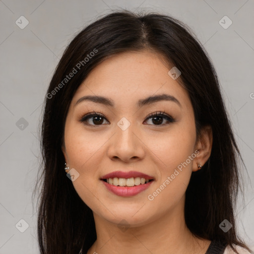 Joyful latino young-adult female with medium  brown hair and brown eyes