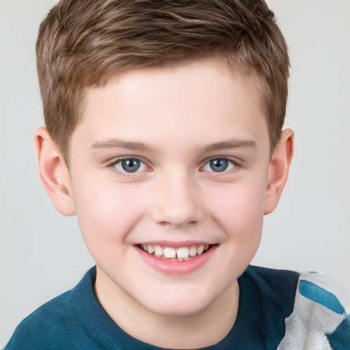 Joyful white child male with short  brown hair and grey eyes