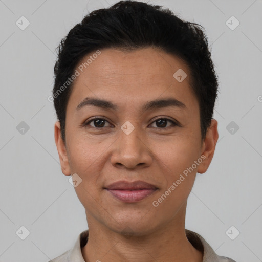 Joyful latino young-adult female with short  brown hair and brown eyes