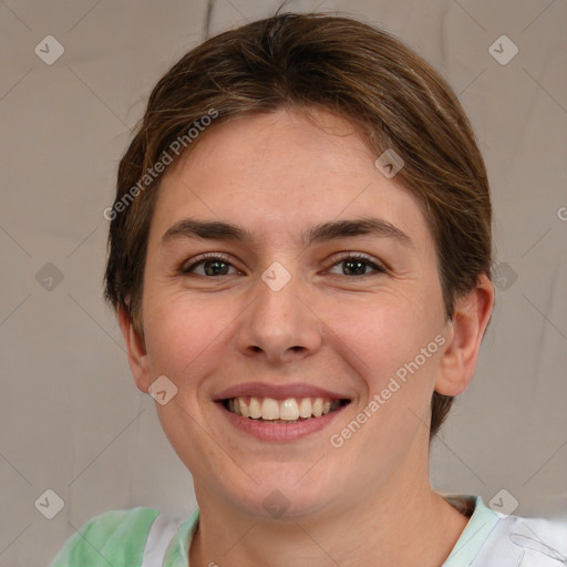 Joyful white young-adult female with medium  brown hair and green eyes