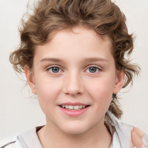 Joyful white child female with medium  brown hair and blue eyes