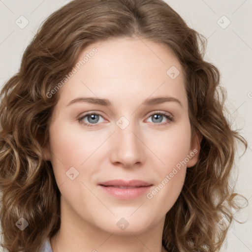 Joyful white young-adult female with long  brown hair and green eyes