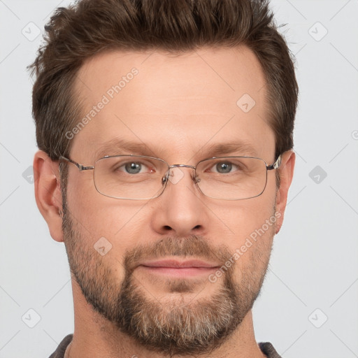 Joyful white adult male with short  brown hair and grey eyes