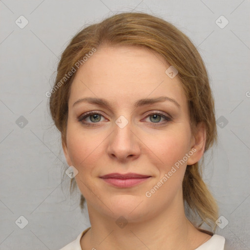 Joyful white young-adult female with medium  brown hair and green eyes