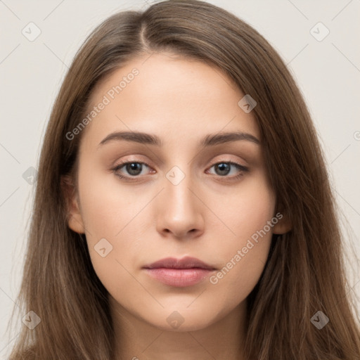 Neutral white young-adult female with long  brown hair and brown eyes