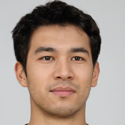 Neutral asian young-adult male with short  brown hair and brown eyes