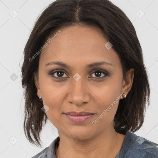 Joyful latino young-adult female with medium  brown hair and brown eyes