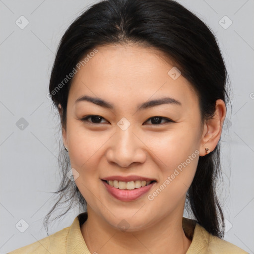 Joyful asian young-adult female with medium  brown hair and brown eyes