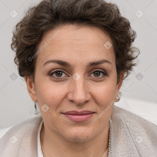 Joyful white adult female with short  brown hair and brown eyes