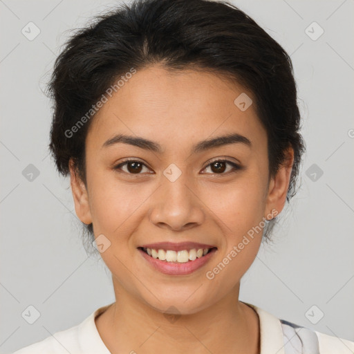 Joyful latino young-adult female with short  brown hair and brown eyes