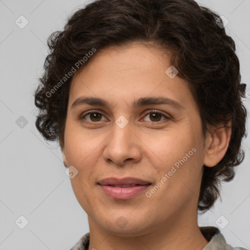 Joyful white adult female with medium  brown hair and brown eyes