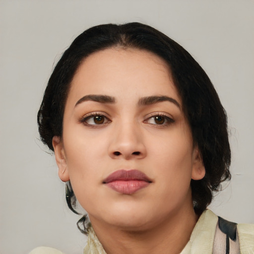 Neutral latino young-adult female with medium  black hair and brown eyes