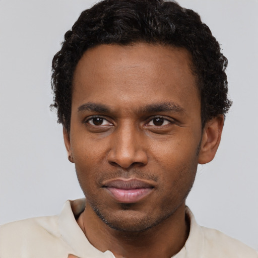 Neutral black young-adult male with short  black hair and brown eyes