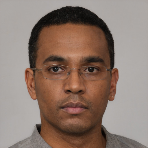 Neutral black young-adult male with short  black hair and brown eyes