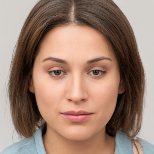 Neutral white young-adult female with medium  brown hair and brown eyes