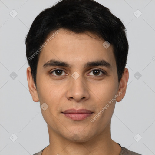 Joyful white young-adult male with short  black hair and brown eyes