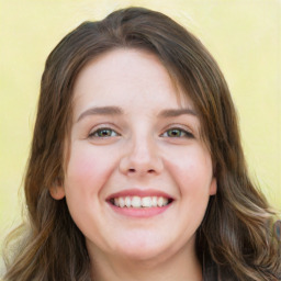 Joyful white young-adult female with long  brown hair and green eyes