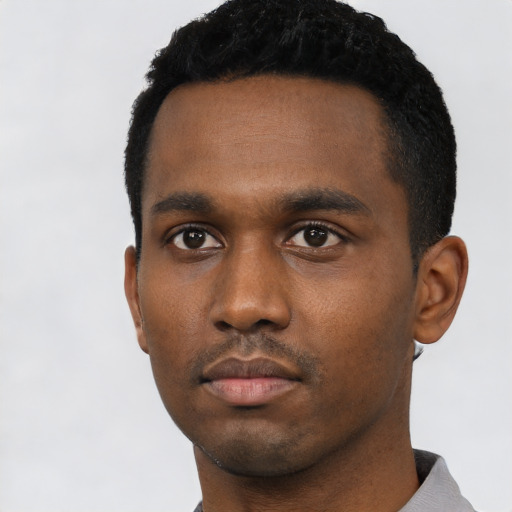 Neutral black young-adult male with short  black hair and brown eyes