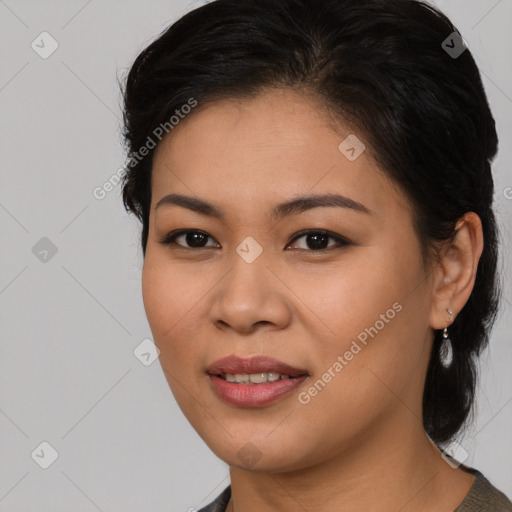 Joyful asian young-adult female with long  brown hair and brown eyes