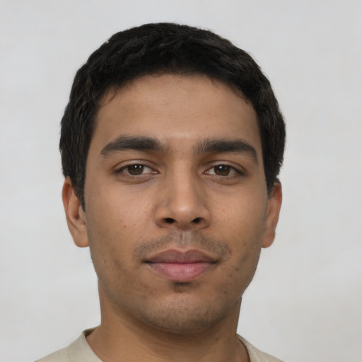 Neutral latino young-adult male with short  black hair and brown eyes