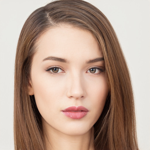 Neutral white young-adult female with long  brown hair and brown eyes