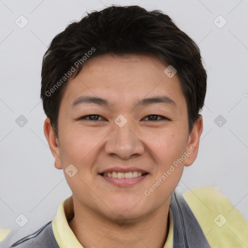 Joyful asian young-adult male with short  brown hair and brown eyes