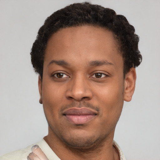 Neutral latino young-adult male with short  brown hair and brown eyes