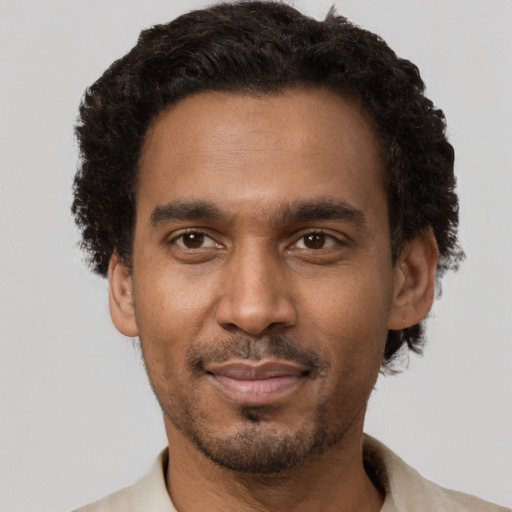 Neutral black young-adult male with short  brown hair and brown eyes