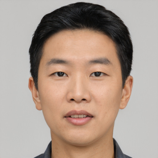 Neutral asian young-adult male with short  black hair and brown eyes