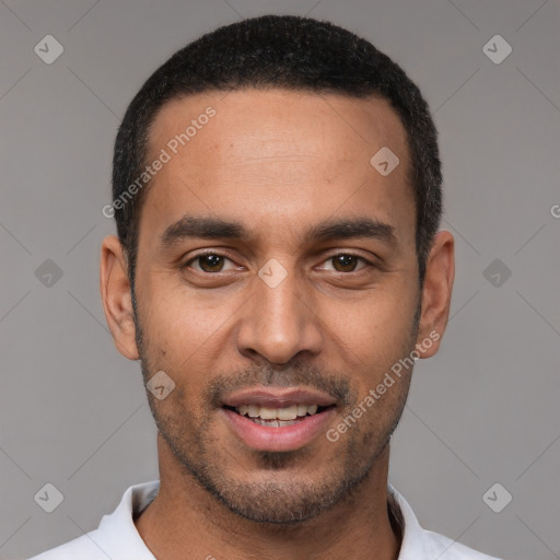 Joyful white young-adult male with short  black hair and brown eyes