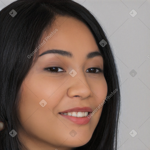 Joyful latino young-adult female with long  brown hair and brown eyes