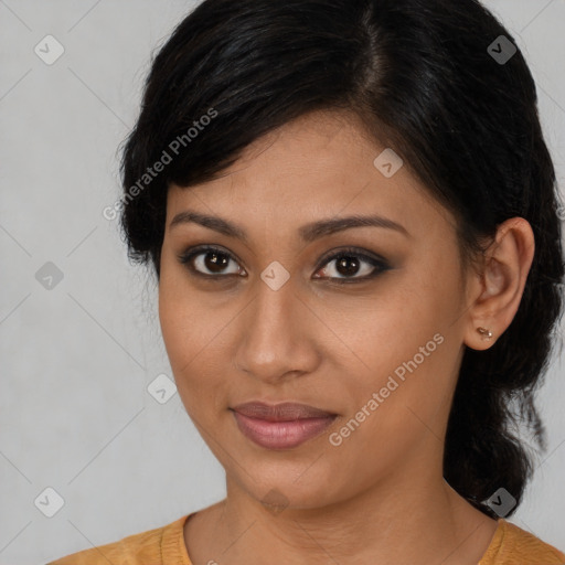 Joyful latino young-adult female with medium  brown hair and brown eyes