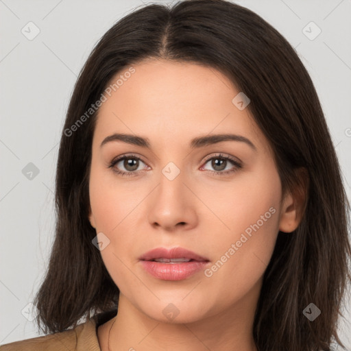 Neutral white young-adult female with long  brown hair and brown eyes