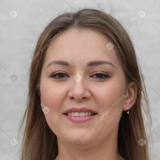 Joyful white young-adult female with long  brown hair and grey eyes