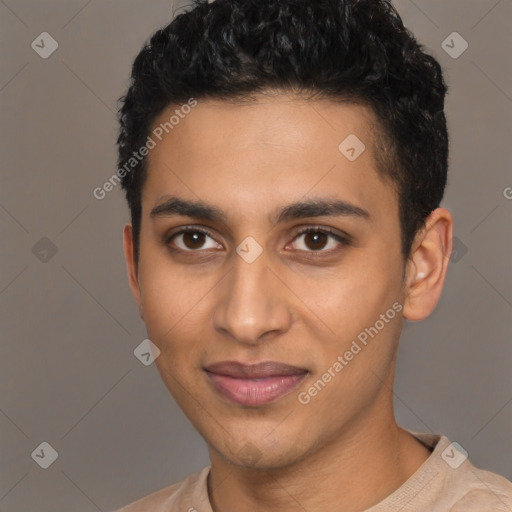 Joyful latino young-adult male with short  black hair and brown eyes